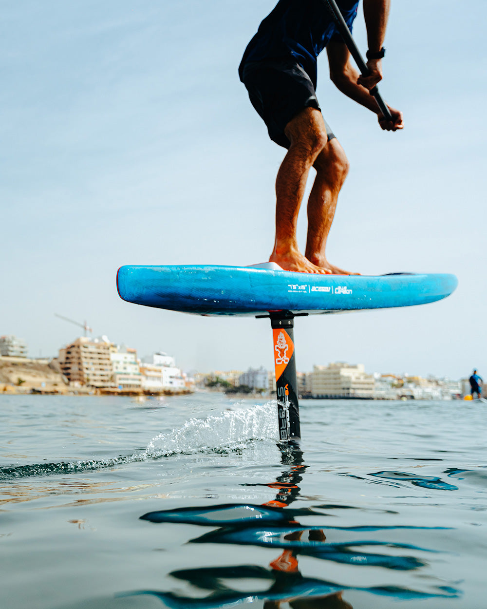 Ace Foil Lightning hydrofoil board with blue, black, orange accents for downwind performance