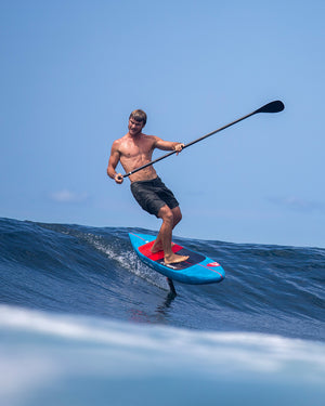 Ace Foil Lightning Foilboard: blue SUP with red fins for downwind performance