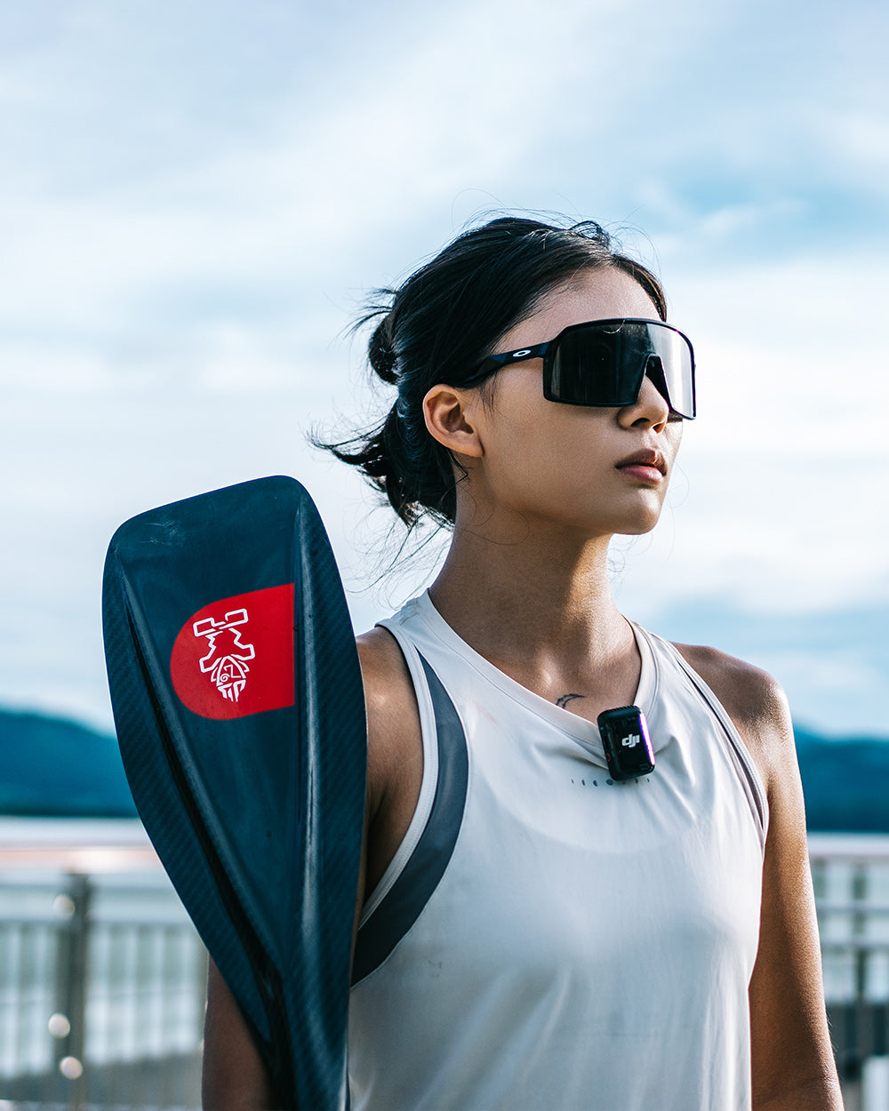 Lima Prepreg Carbon Paddle in black and red with white logo