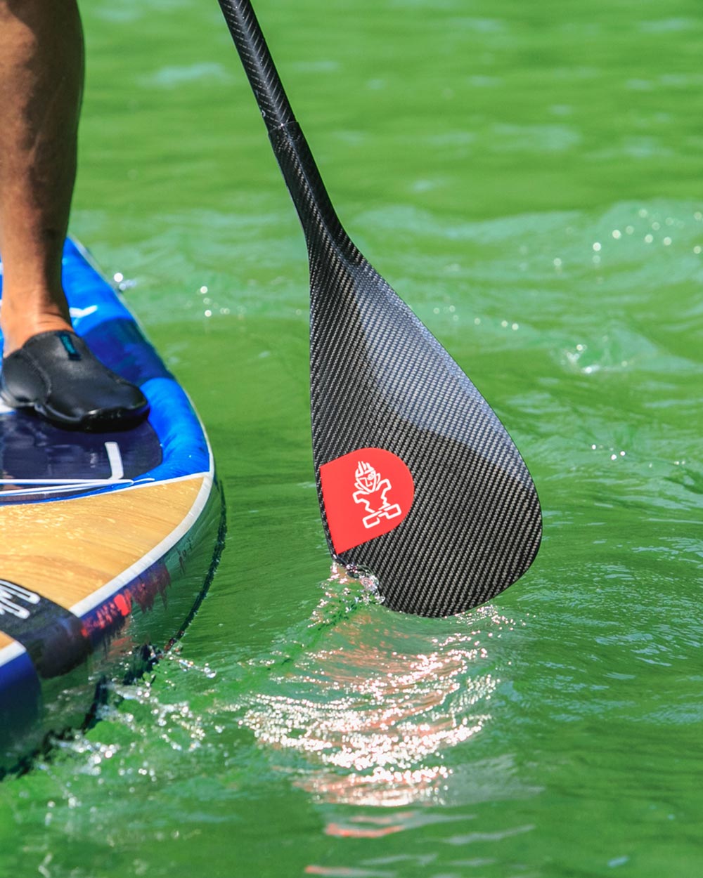 Enduro Prepreg Carbon Paddle with red logo and black grip