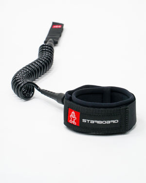 Black coil leash with coiled cord and neoprene wrist strap for ankle or calf