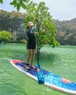 Blue and red Starboard GO Paddleboard for stand-up paddling