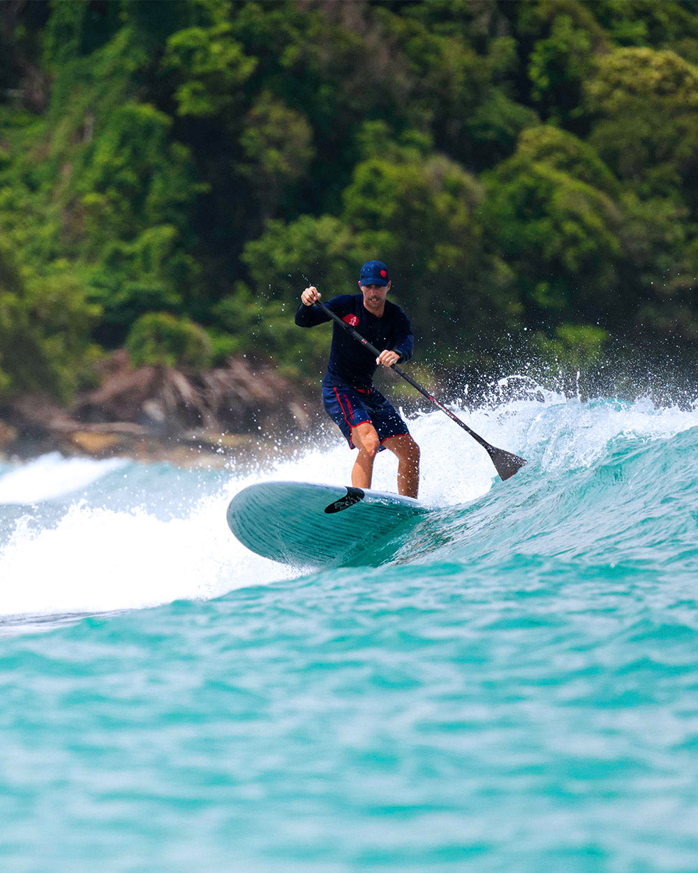 GO Surf Paddleboard: blue with white wave design and black leash
