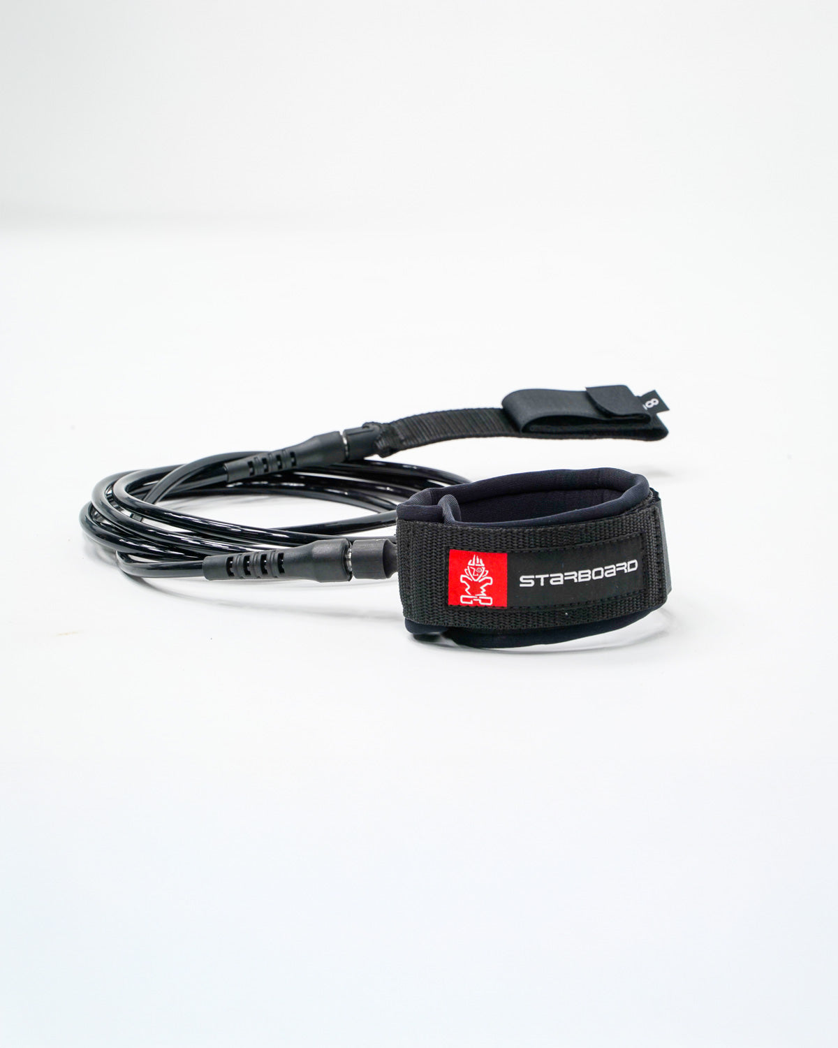 Straight SUP leash in black with Starboard red white logo, ankle calf