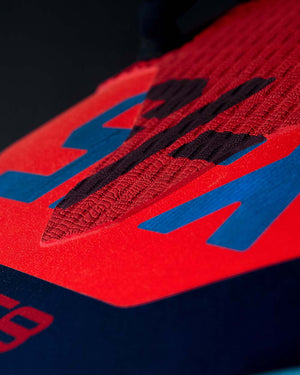 Nike 2025 X-15 Windfoil Board with red blue textured soccer cleat