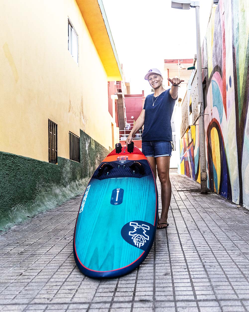 Blue and red inflatable 2025 Kode Windsurf Board with white logo