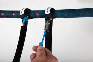 Blue and white adjustable harness lines with hook, nylon strap